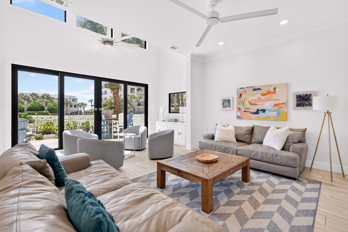 Crystal Oasis living room with sofas and terrace doors